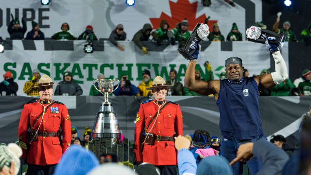 Nov 20, 2022; Regina, Saskatchewan, CAN; Toronto Argonauts linebacker Henoc Muamba (10) celebrates winning both the Most Valuable Canadian and the Most Valuable Player of the the game awards. The Toronto Argonauts defeated the Winnipeg Blue Bombers to win the 2022 Grey Cup Championship at Mosaic Stadium. Toronto won 24-23. Mandatory Credit: Bob Frid-USA TODAY Sports  